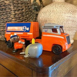 Paw patrol big truck pup zuma semi truck, character, and whale.